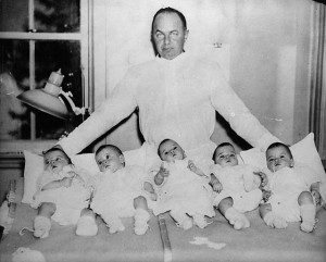 It's just the stoic era of black-and-white photography. The government did not force him to have all those babies.